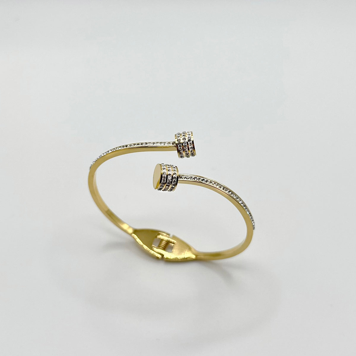 Elegant Criss Cross Gold Bangle