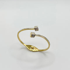 Elegant Criss Cross Gold Bangle